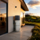 Rinnai hydraheat heat pump hot water cylinder installed outside a house